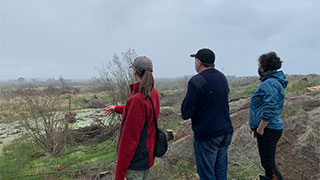 Greg showing the Waimakariri Water Zone Committee around the wetland.