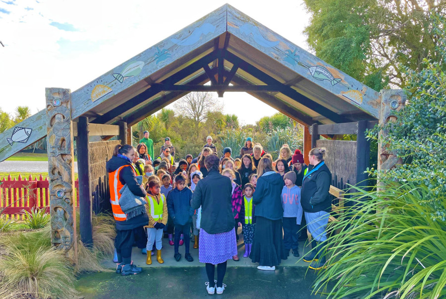 Students from Te Rōhutu Whio schools in Rolleston are greeted with a pōwhiri