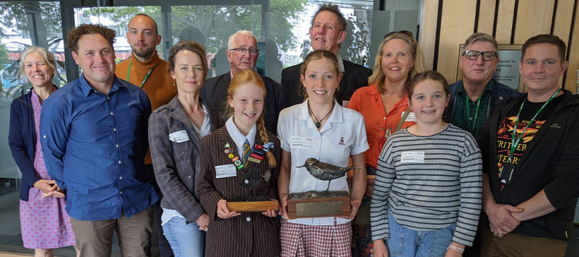 Millie Palmer (winner) and finalist Holly Fraser with judge Jon Hickford, and Environment Canterbury Councillors