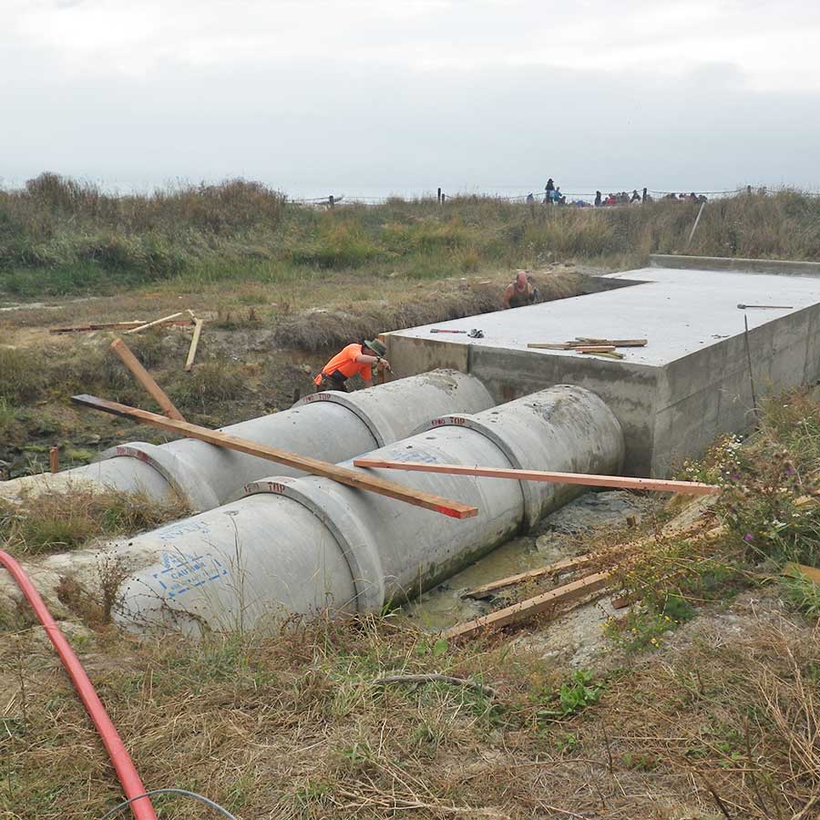 In 2014 the seaward end pipes were secured in concrete