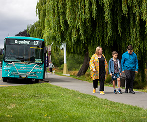 Bus passengers exiting the bus